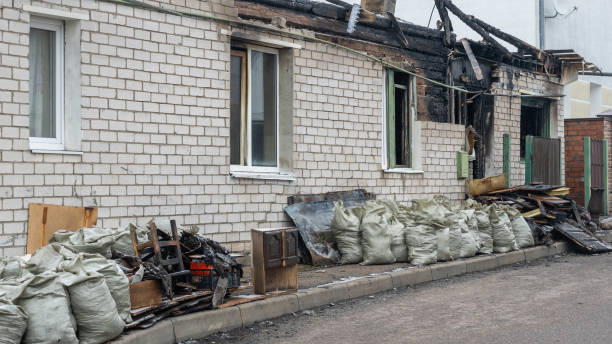 Professional Fire Damage Restoration technician working in Wimauma, FL